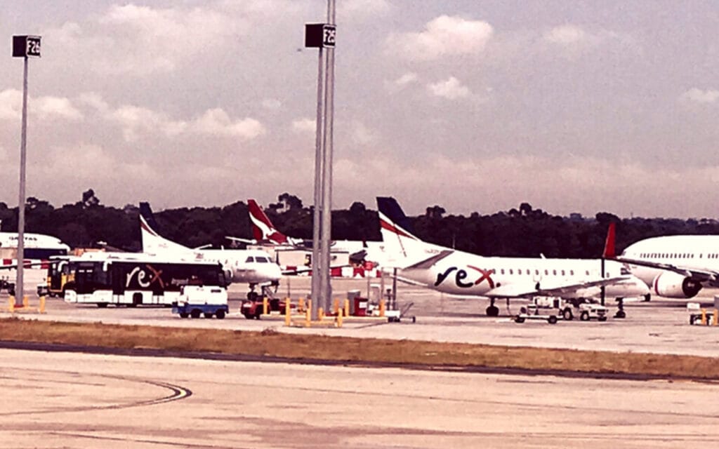 Several planes parked on the tarmac