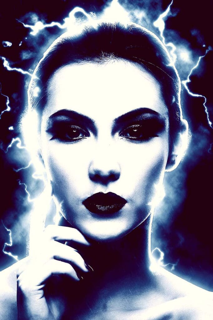 Stunning Woman's head surrounded by blue lightning and smoke