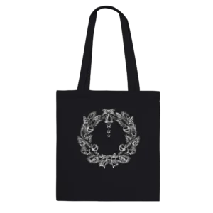 Wreath long handled tote bag features a Christmas wreath, intricately designed with pine leaves, stars and round baubles, with a bell at the top and a bow at the bottom